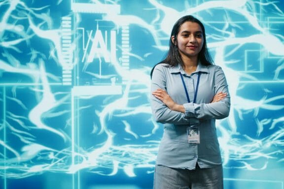 Portrait of joyful admin tasked with AI applications development