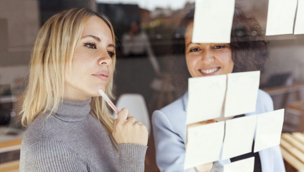 Business women creating a plan in coworking space