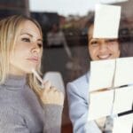 Business women creating a plan in coworking space